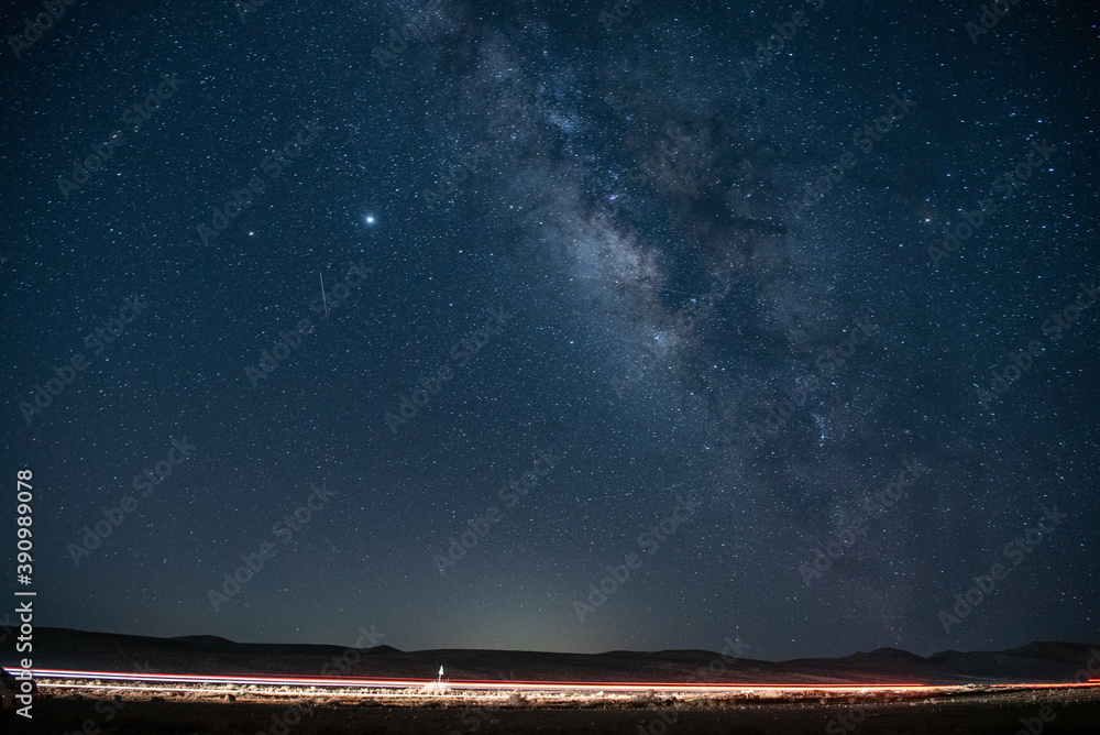 Landscape of Negev under a breathtaking starry sky at night in Israel