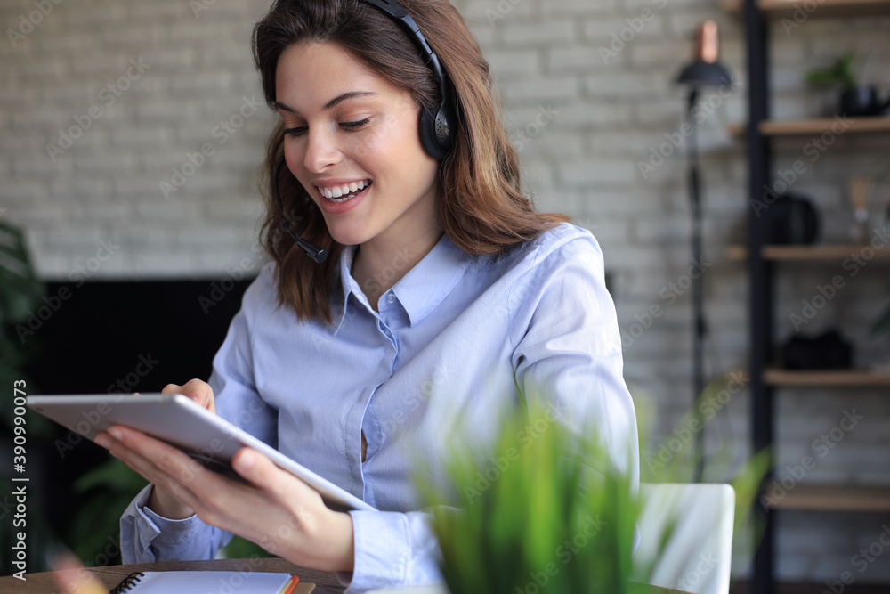 Freelance business women using tablet working call video conference with customer in workplace at home. Freelance business women using tablet working call video conference with customer in workplace at home.
