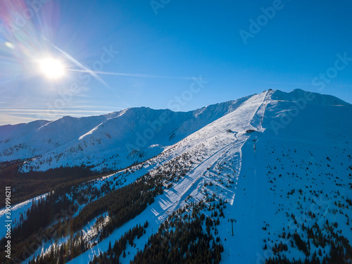 Sun and Ski Slopes at the Resort. Aerial View