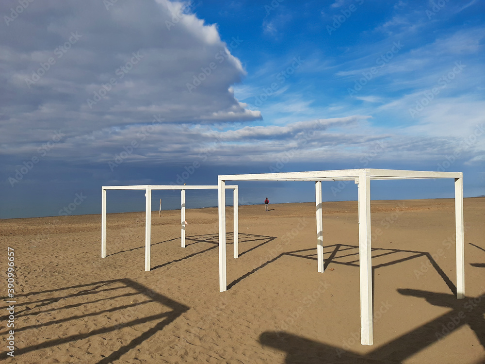 Wooden structures on the beach of Donoratico Tuscany Italy Wooden structures on the beach of Donoratico Tuscany Italy