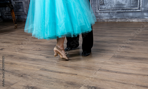 beautiful female dancer legs in golden dance shoes