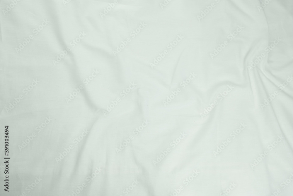 white wrinkled bed sheet, the concept of sexuality, a good photo of the decal or background