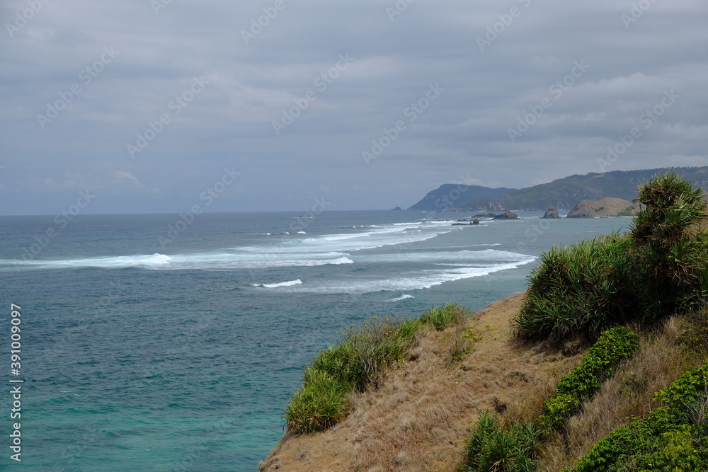 Indonesia Lombok - Coastal landscape at Merese Hills Sunset viewpoint Indonesia Lombok - Coastal landscape at Merese Hills Sunset viewpoint
