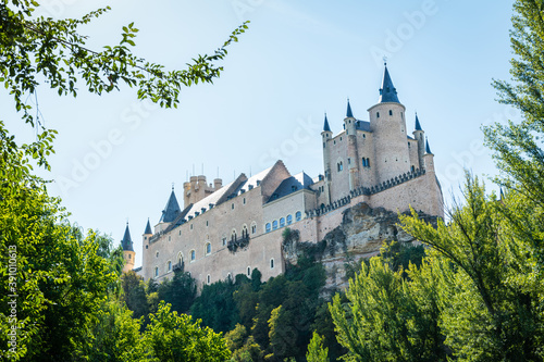 Low angle view of the Alcazar  a stone castle-palace located in the walled old city of Segovia  Spain.
