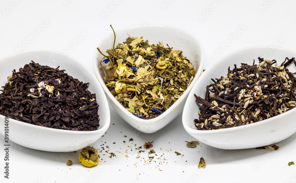 three bowls of loose tea on white background three bowls of loose tea on white background