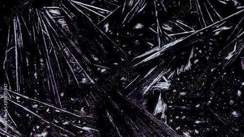 Macro shot of ice crystals forming on window, made from timelapse, footage of real freezing glass on black background
