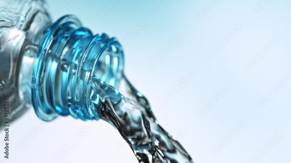 Super slow motion of pouring water from bottle into glass. Filmed at 1000 fps. Super slow motion of pouring water from bottle into glass. Filmed at 1000 fps.