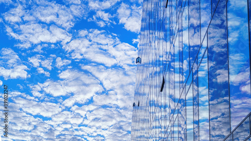 Bright cloudy sky and its r...