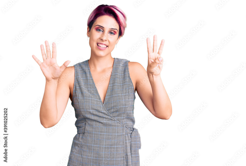 Young beautiful woman with pink hair wearing casual clothes showing and pointing up with fingers number eight while smiling confident and happy. Young beautiful woman with pink hair wearing casual clothes showing and pointing up with fingers number eight while smiling confident and happy.