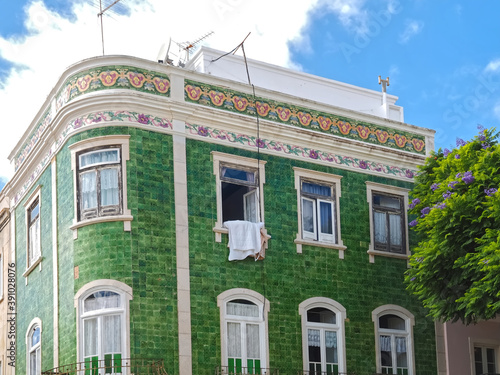 The beauty of Portugal - famous house wit green tiles in Lagos