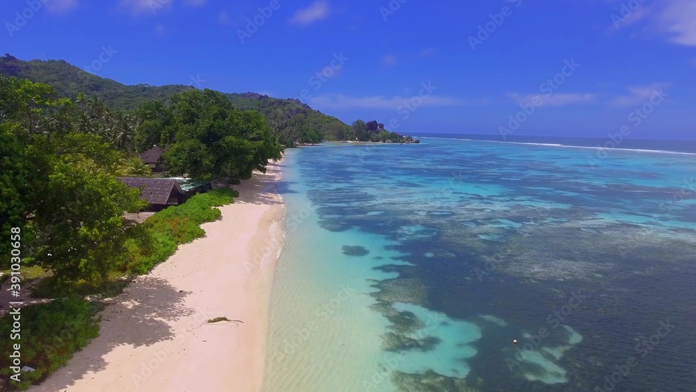 Amazing La Digue Beach on a beautiful day, Seychelles aerial view from drone