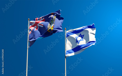 Beautiful national state flags of South Georgia and the South Sandwich Islands and Israel together at the sky background. 3D artwork concept.