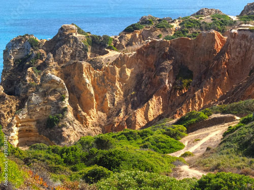 The beauty of Portugal - hiking in Lagos at the blue Atlantic ocean in Portugal