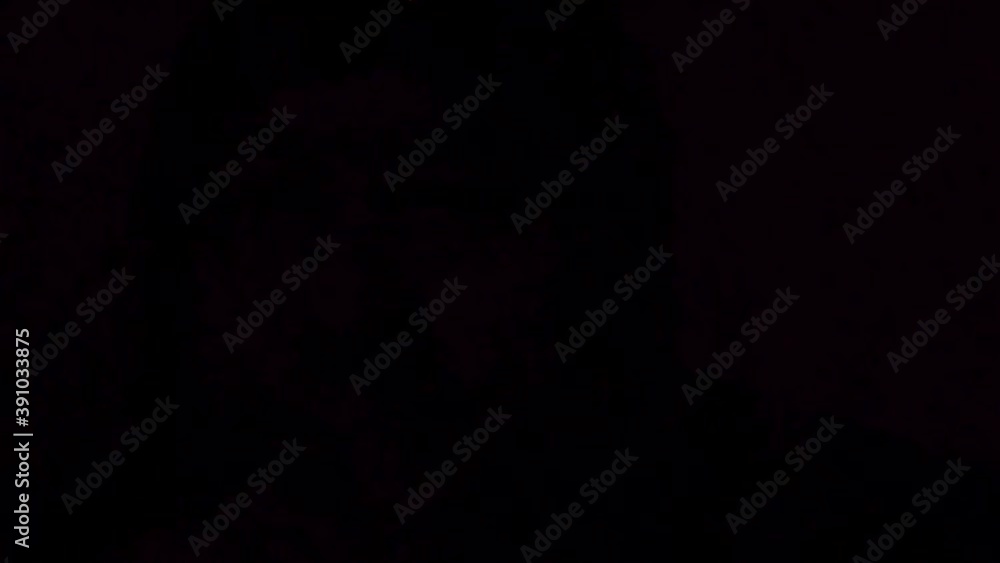 Adult Male Wearing Hoodie Rocking Back And Forth With Red Blue Strobing Lighting. Locked Off Adult Male Wearing Hoodie Rocking Back And Forth With Red Blue Strobing Lighting. Locked Off