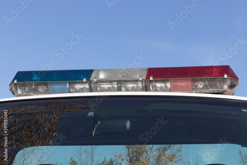 Police light bar, roof mounted red and blue lights. For use in traffic stops and emergencies.