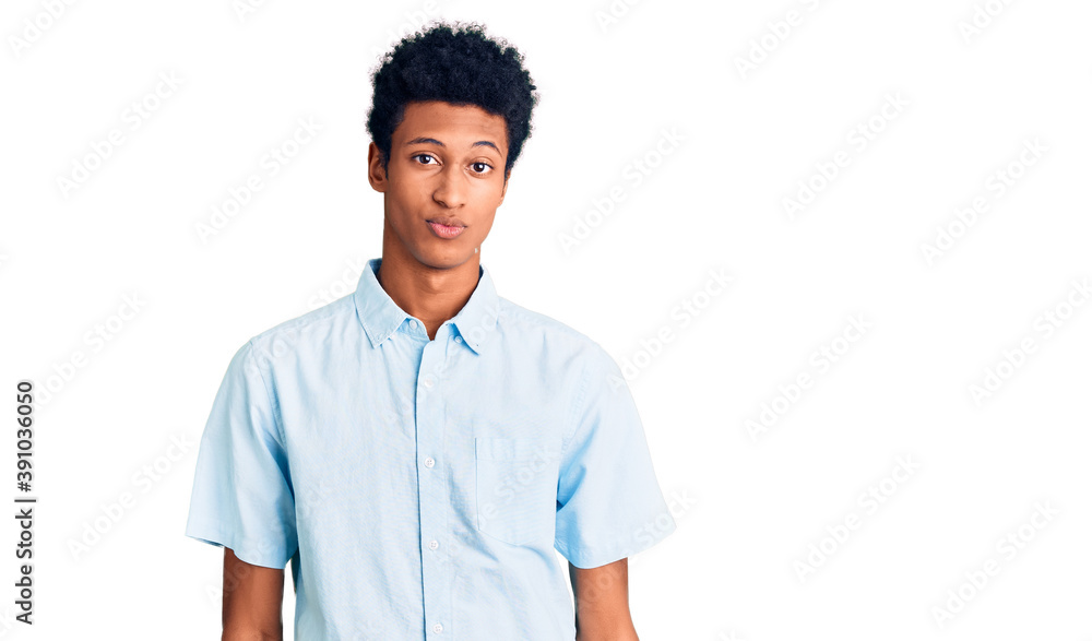 Young african american man wearing casual clothes looking sleepy and tired, exhausted for fatigue and hangover, lazy eyes in the morning. Young african american man wearing casual clothes looking sleepy and tired, exhausted for fatigue and hangover, lazy eyes in the morning.