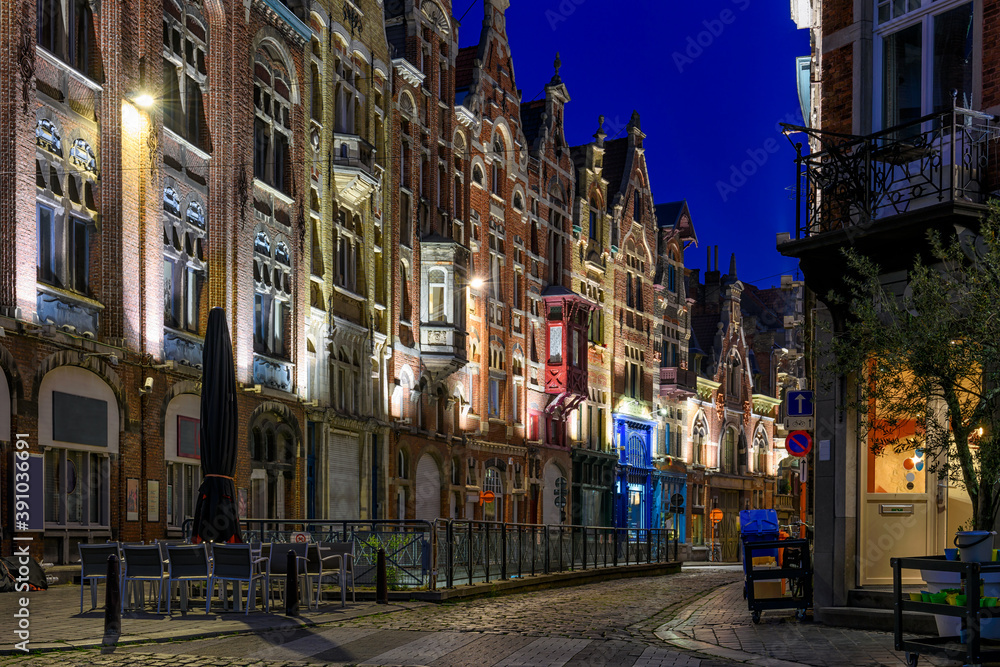 Obraz premium Old street in Ghent (Gent), Belgium. Architecture and landmark of Ghent. Night cityscape of Ghent.