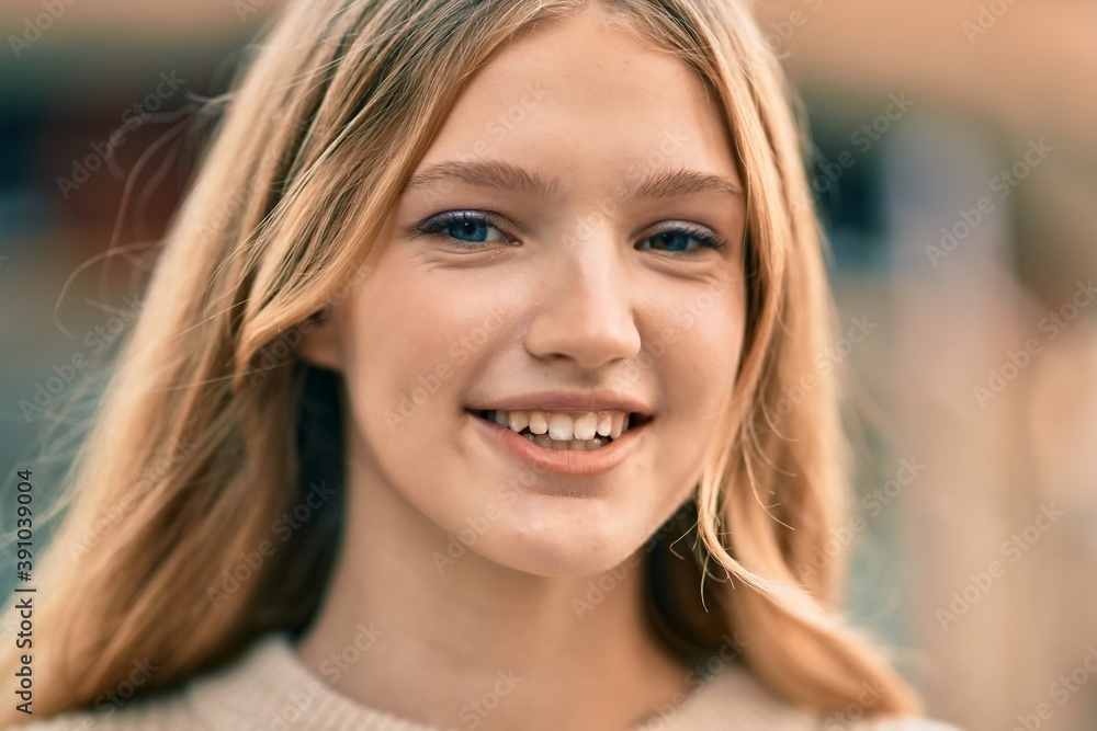 Beautiful caucasian teenager smiling happy standing at the city. Beautiful caucasian teenager smiling happy standing at the city.