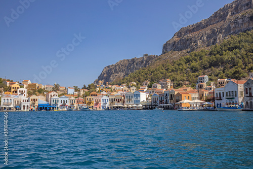 Colorful waterfront buildings of the Greek Island Kastellorizo © Milton