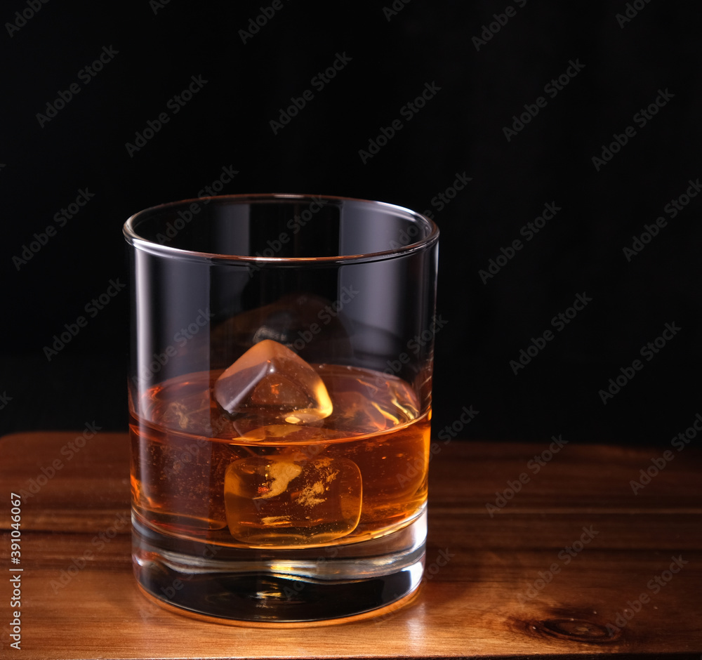 whiskey in a glass with ice whiskey in a glass with ice