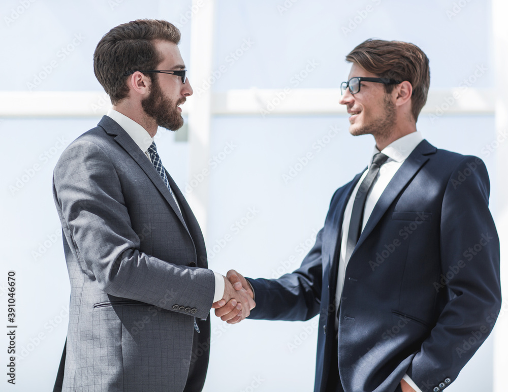 two business people shaking hands