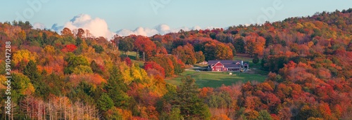 Vászonkép Beautiful Fall colors farm house panorama