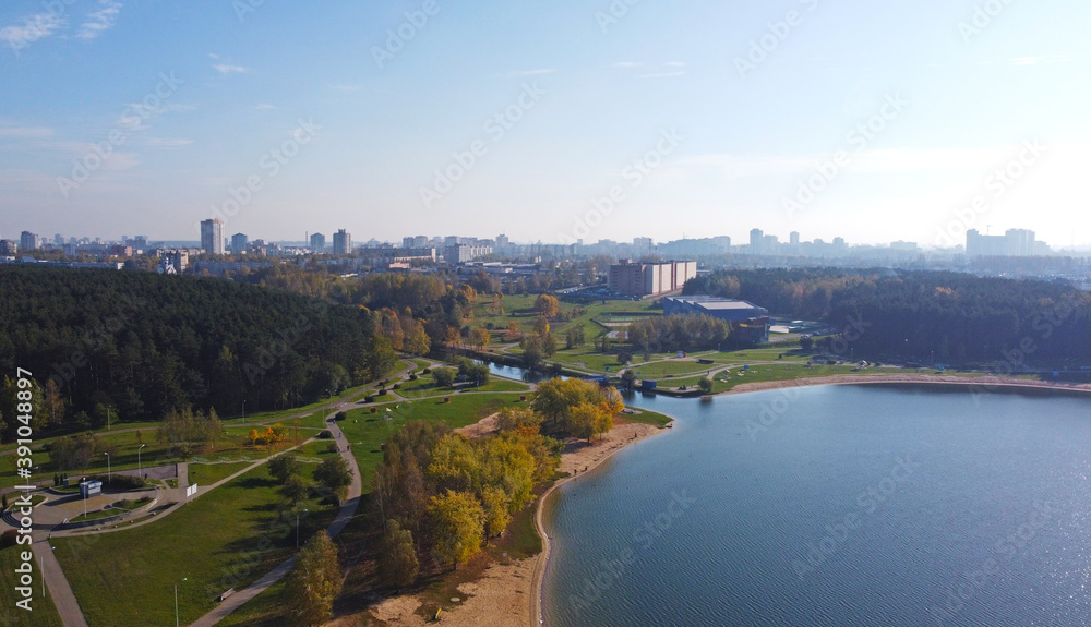 Top view of the city lake near the summer park