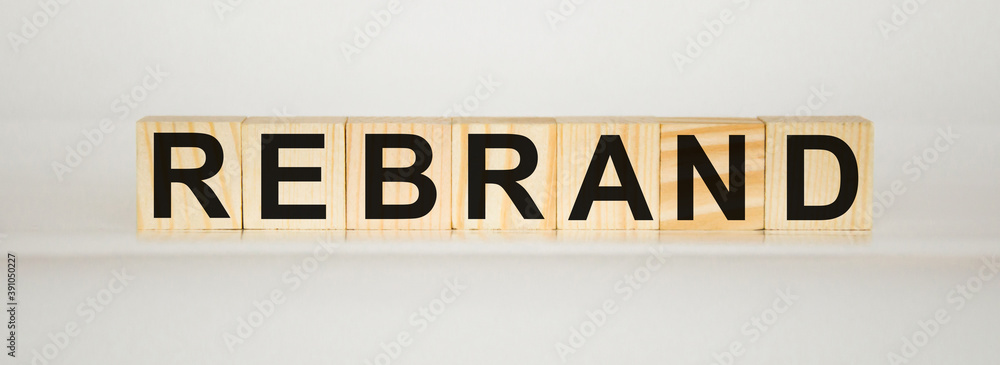 Fototapeta premium the word rebranding is written on a notebook on a white background. marketing idea