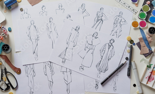Konstfotografi Fashion designer stylish drawings sketches textile fabric material Costume