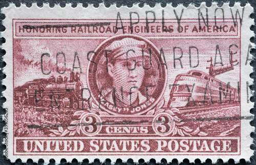USA - Circa 1950 : a postage stamp printed in the US showing a portrait of John Luther “Casey” Jones, who was killed in a train wreck near Vaughn, Mississippi Text: Railroad Engineers of America