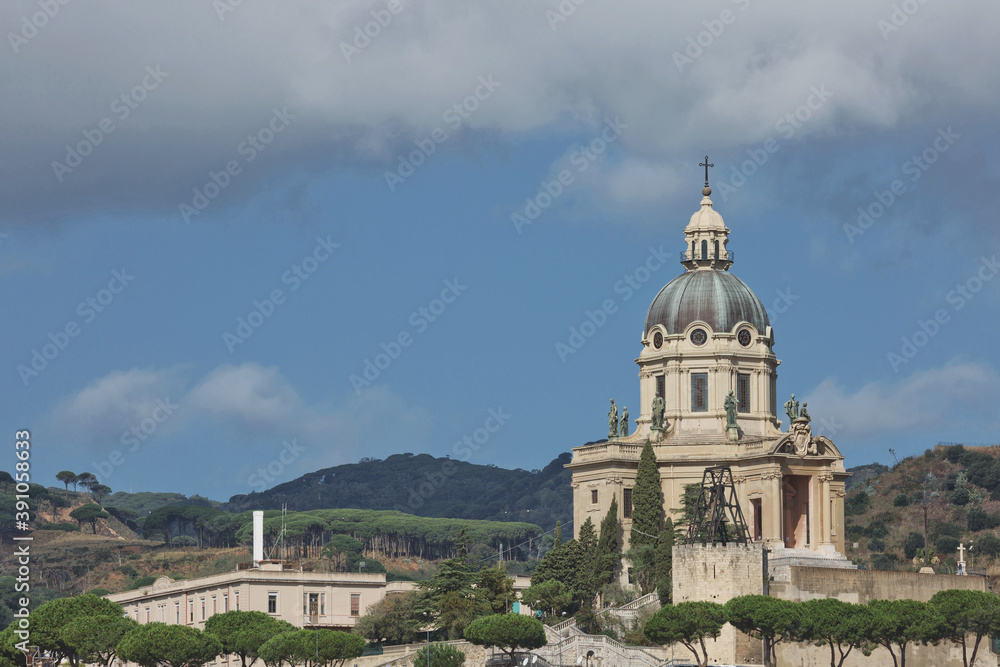 The dome of Church of King (Cristo Re) overlooking the city of Messina in Italy during summer. Beautiful photo of the landmark in Sicily