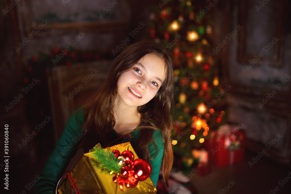 joyful and cheerful young girl on a festive winter evening joyful and cheerful young girl on a festive winter evening