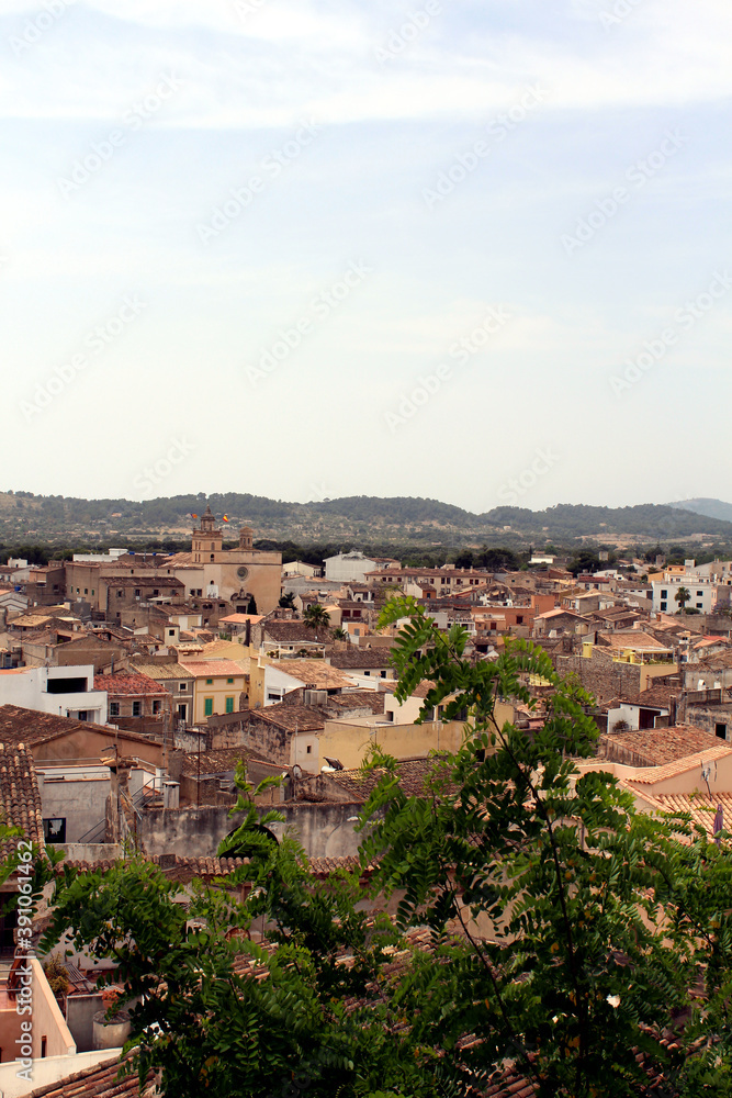 Panoramic view of the old town of Arta on the island of Mallorca, Spain. View from the Cathedral of San Salvador. Vertical orientation.