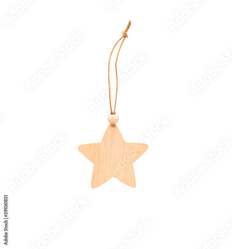 Isolated wooden star decoration for Christmas tree