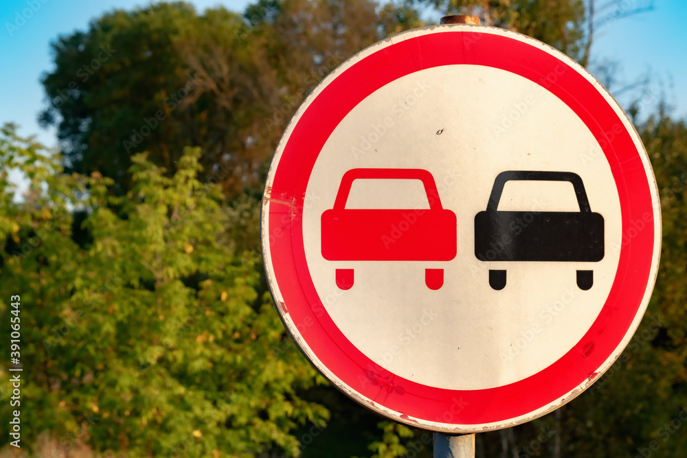 Road sign prohibiting overtaking on the side of the road Road sign prohibiting overtaking on the side of the road