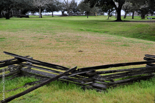 The orchard with old wooden fence, George Ranch Historical Park, Richmond, Texas photo