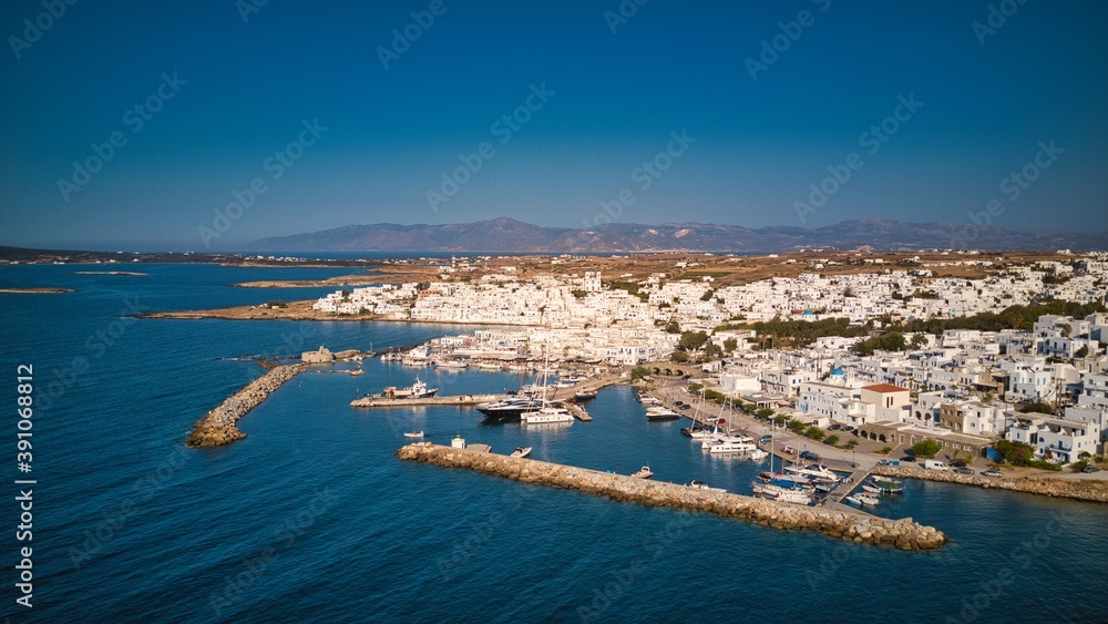 Aerial view of the pier with Paros island on a Naousa village