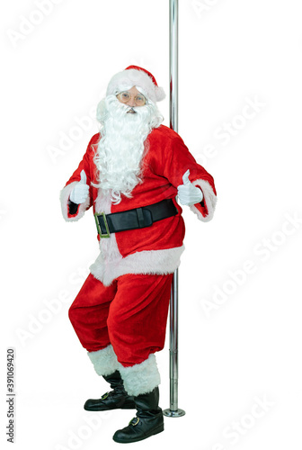 Lustful Santa is pole dancer, shows thumb fingers up. Depraved Santa Claus dances with pole on white background. Christmas coming
