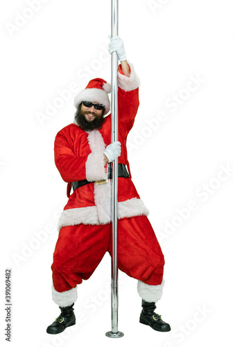Santa is pole dancer. Lustful arabic young Santa Claus with black beard dances with pole on white background