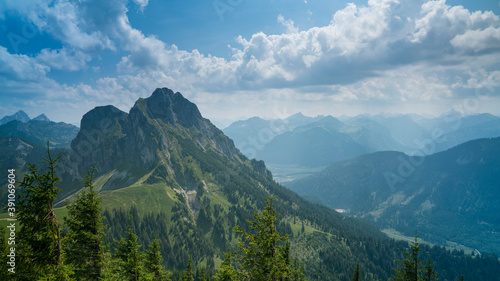 Germany, Allgaeu, Aggenstein, Impressive high mountain view from above, countless green trees covering nature scenery