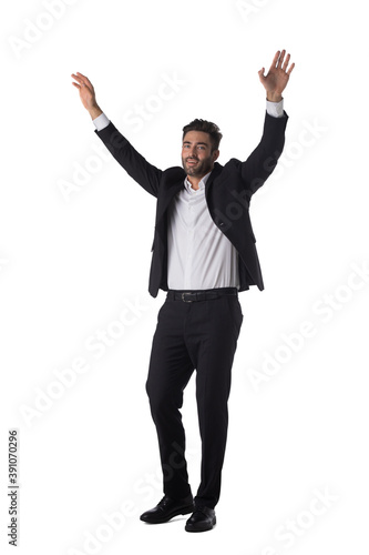 Portrait of business man with arms up