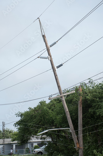 A utility pole broken by storm damage after a hurricane swept through the Cayman Islands