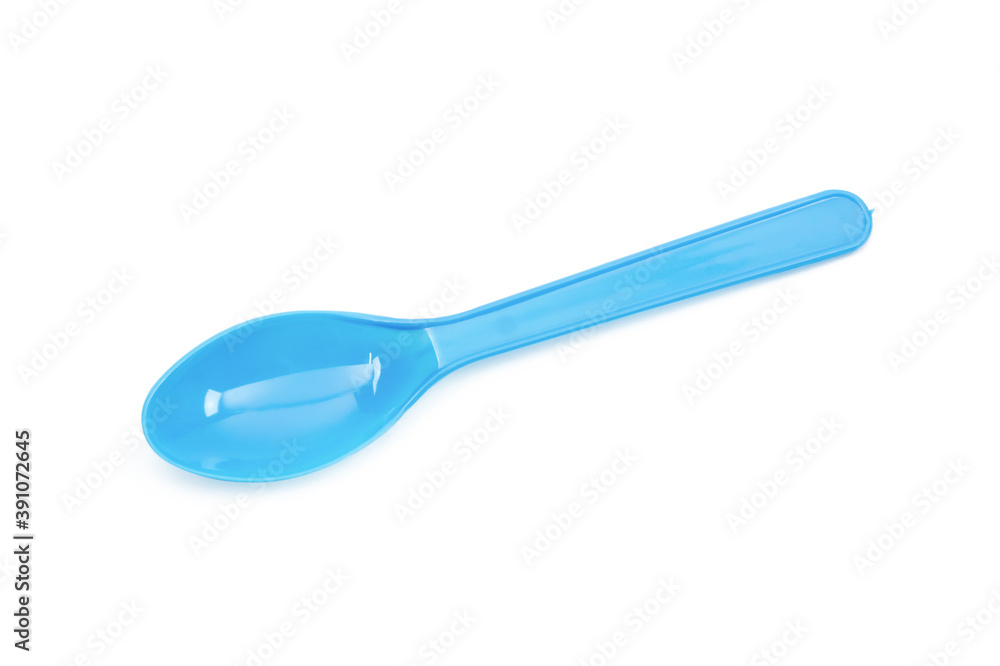 Blue plastic spoon isolated on white background. Blue plastic spoon isolated on white background.