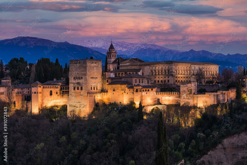 Alhambra Arabic Palace in Granada,Spain Illuminated at Twilight. Sunset Over Alhambra