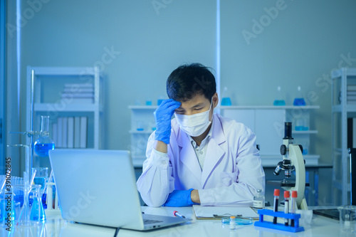 Depressed and stressful scientist in laboratory  Science and technology healthcare concept