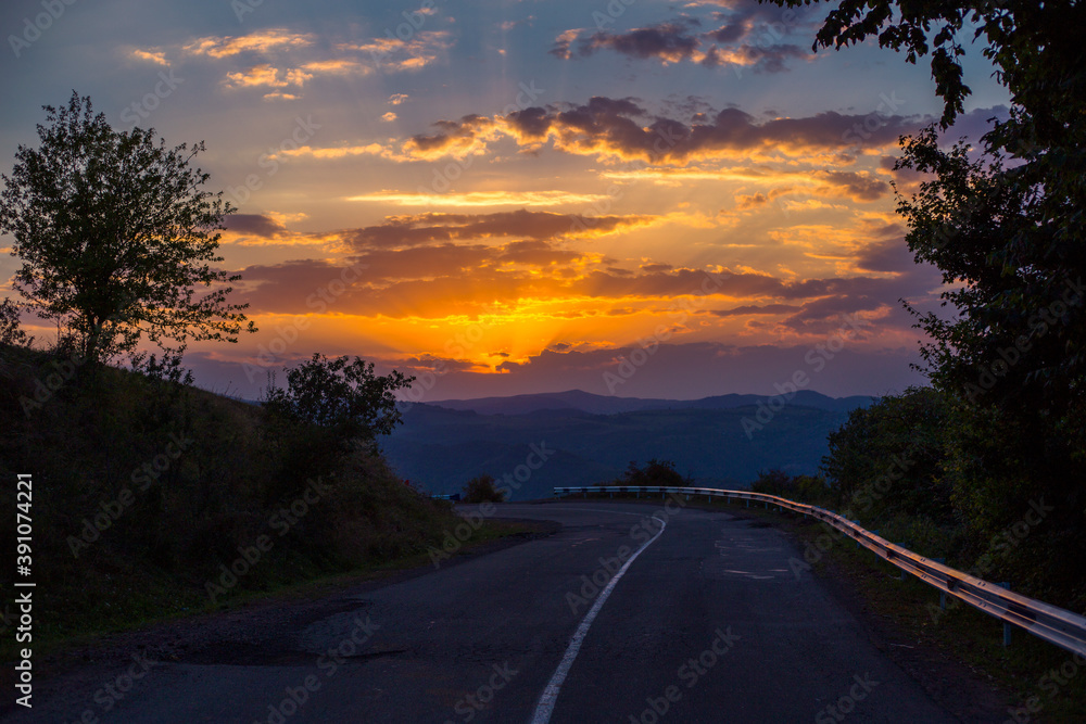 Road and nature in a sunset