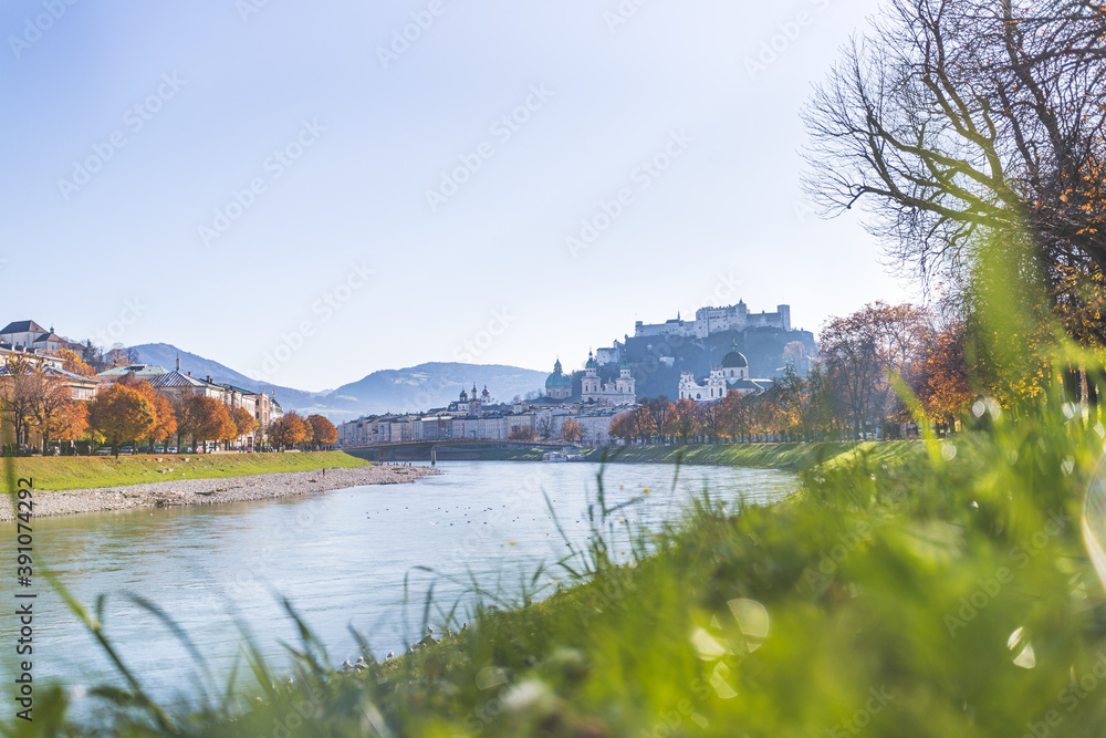 European city trip: Salzburg old city and river salzach in autumn, colorful sunshine, Austria European city trip: Salzburg old city and river salzach in autumn, colorful sunshine, Austria