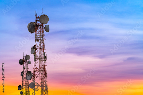 Canvas Print telecommunication tower at sunset sky background