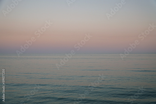 Sunset sky over estuary or sea
