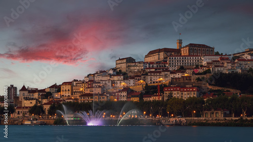 Evening panorama of the university and the historic city center of Coimbra.